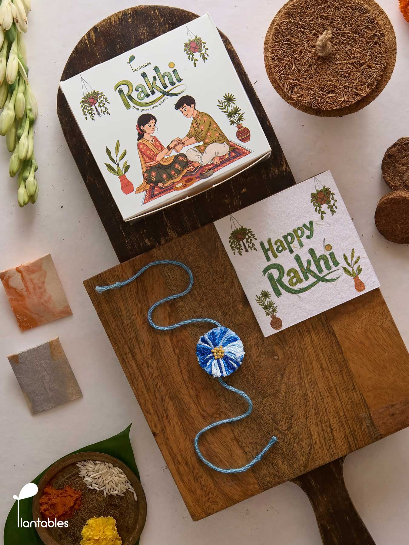 Evil Eye Thread Rakhi Planting Kit with seed paper greeting card, roli chawal pockets and coir pot