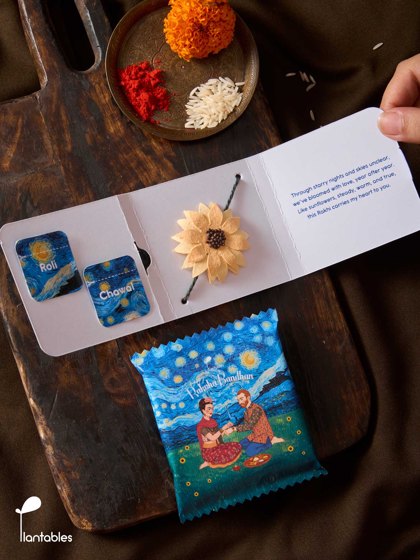 Sunflowers on a Starry Night Rakhi with pack artwork of Frida Kahlo tying a rakhi on Van Gogh